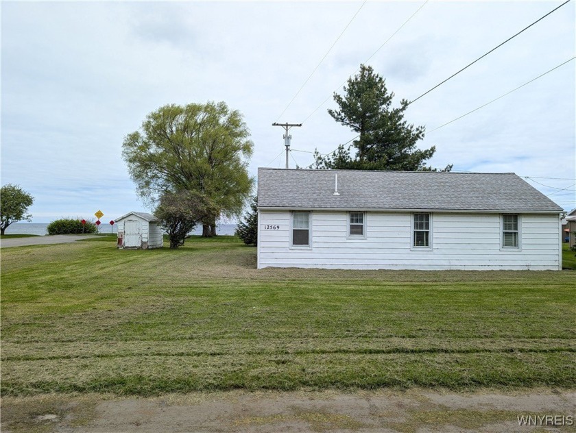 Great price for this fixer upper with lake views and deeded Lake - Beach Home for sale in Carlton, New York on Beachhouse.com