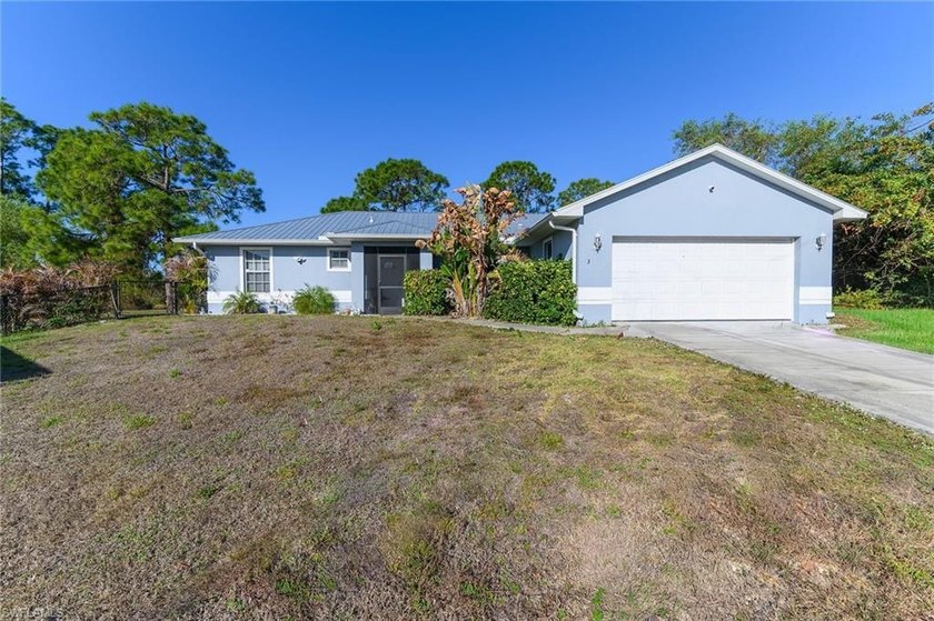 Beautifully Renovated Canal-Front Home on a Spacious Lot! Enjoy - Beach Home for sale in Lehigh Acres, Florida on Beachhouse.com