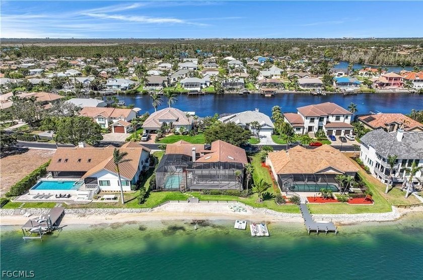 **WATCH VIDEO** Luxury Lakefront Living with Gulf Access! - Beach Home for sale in Fort Myers, Florida on Beachhouse.com