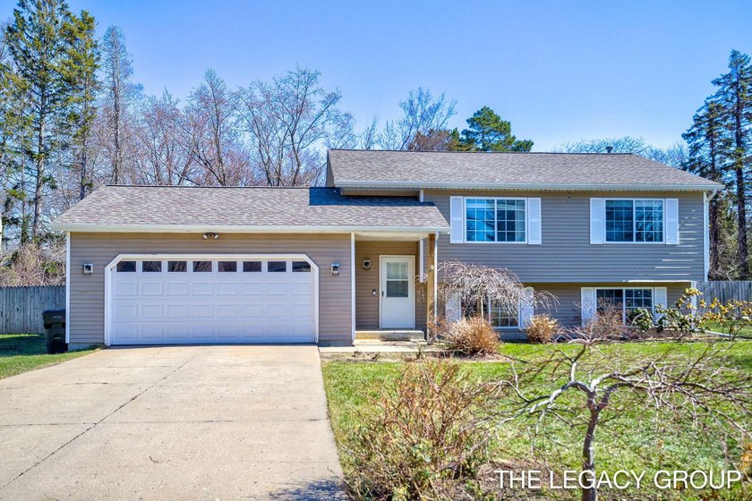 Welcome to this beautifully maintained 4 bedroom, 2 bath home - Beach Home for sale in Holland, Michigan on Beachhouse.com