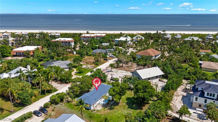 Located on Sanibel's coveted East End, this beachside duplex - Beach Home for sale in Sanibel, Florida on Beachhouse.com