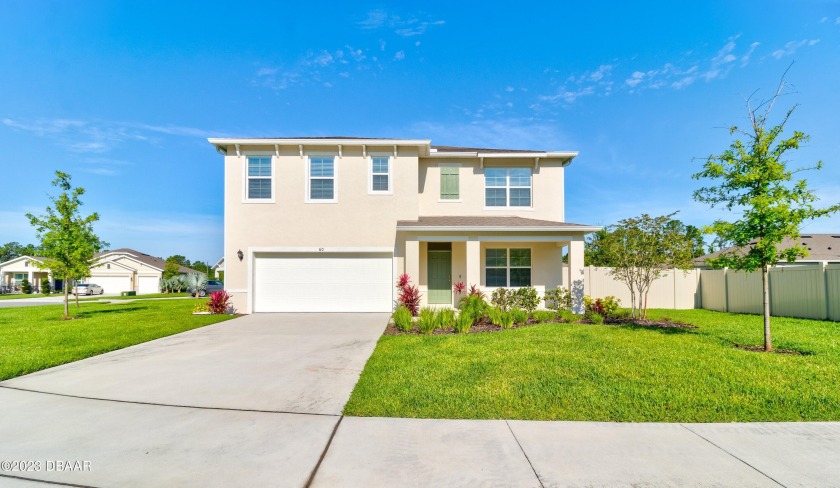 This NEW home offers 5  bedrooms and a bonus room which could be - Beach Home for sale in Ormond Beach, Florida on Beachhouse.com