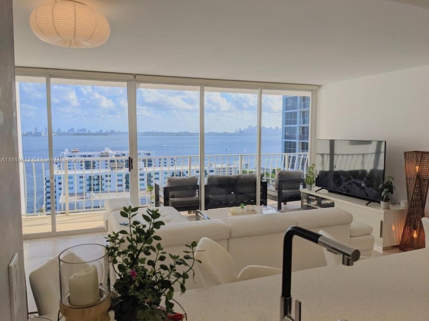 FULLY REMODELED and FURNISHED CORNER SPLIT PLAN 2/2 with - Beach Condo for sale in North Bay Village, Florida on Beachhouse.com