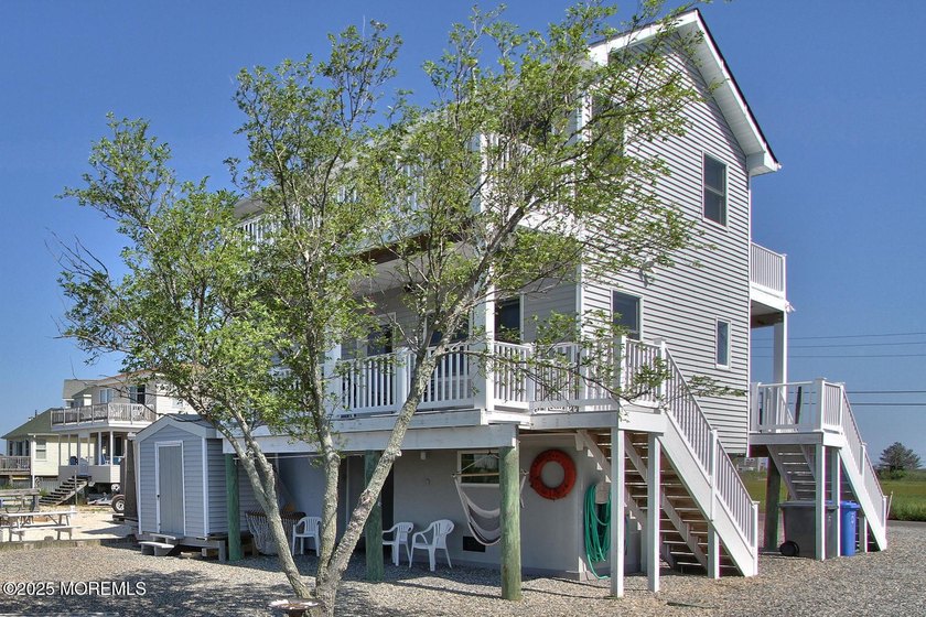 WATERFRONT - OPEN BAY ACCESS - TURN-KEY LIVING WATERFRONT-with - Beach Home for sale in Manahawkin, New Jersey on Beachhouse.com