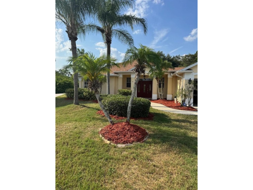 This wonderful 3/2 pool home situated on a generous 0.63-acre - Beach Home for sale in Melbourne, Florida on Beachhouse.com