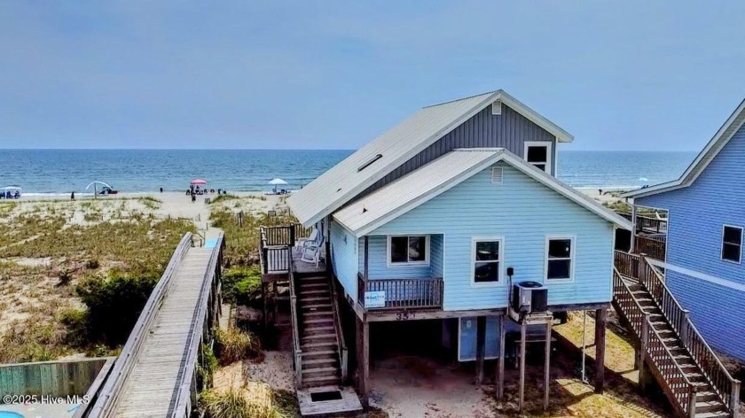 This oceanfront 4-bedroom, 2-bath vacation rental home is - Beach Home for sale in Holden Beach, North Carolina on Beachhouse.com