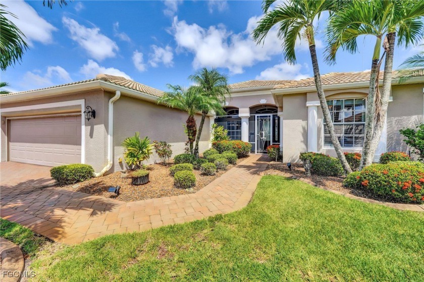 Golf Course Living with Scenic Lake Views. This exceptional - Beach Home for sale in North Fort Myers, Florida on Beachhouse.com
