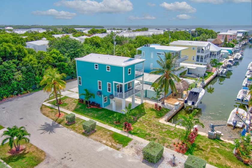 Welcome to your dream home in the highly desirable Harborage - Beach Home for sale in Key Largo, Florida on Beachhouse.com