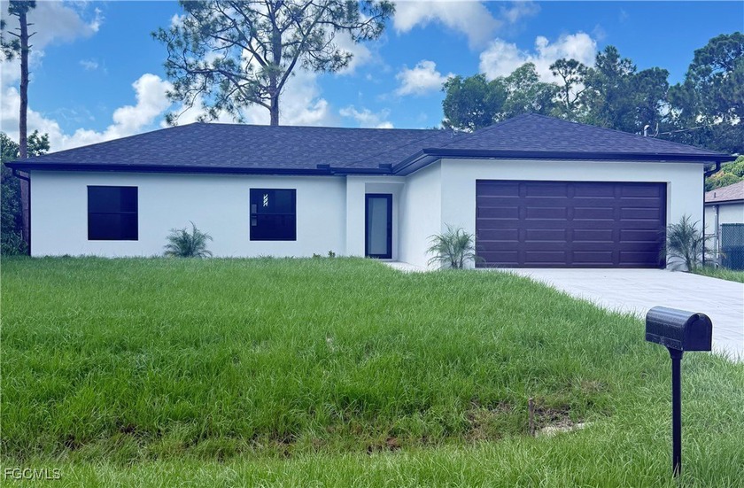 This charming home offers 3 Bedrooms,2 full baths and an - Beach Home for sale in Lehigh Acres, Florida on Beachhouse.com