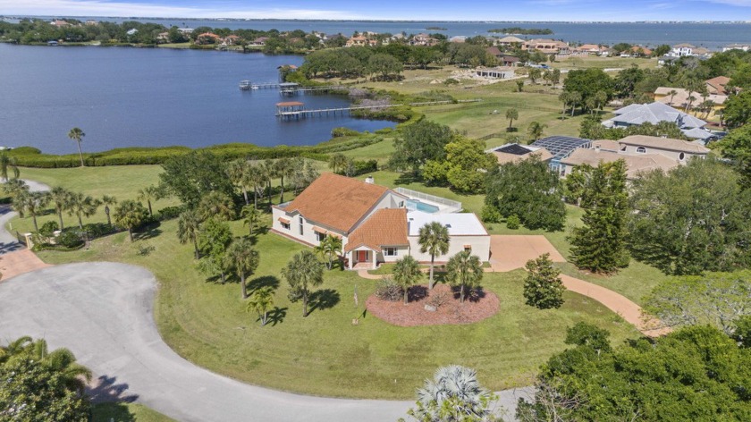 A rare find with expansive views of Honeymoon Lake in gorgeous - Beach Home for sale in Merritt Island, Florida on Beachhouse.com