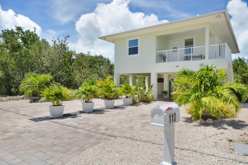 Nothing compares to unparalleled coastal living. Nestled on - Beach Home for sale in Marathon, Florida on Beachhouse.com