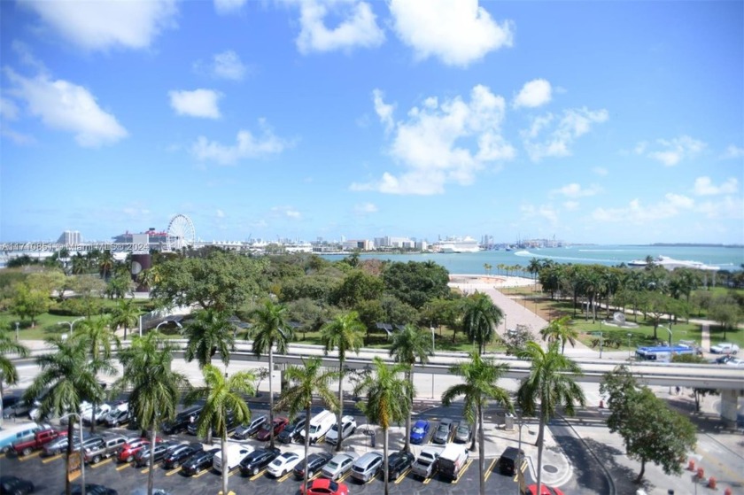 Indulge in the DIRECT BAY VIEW from the balcony of this fully - Beach Condo for sale in Miami, Florida on Beachhouse.com