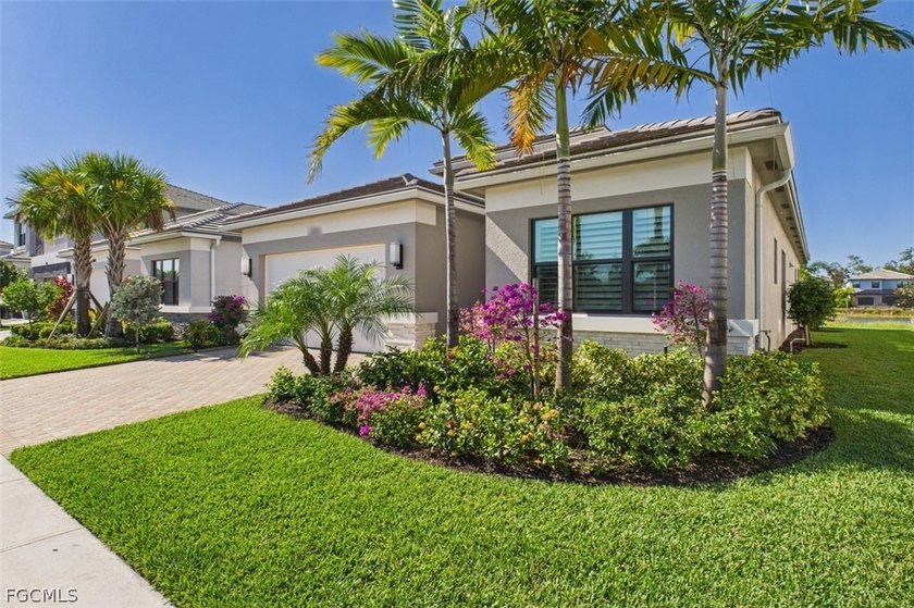 STUNNING LAKEFRONT HOME in RIVERCREEK, a NATURAL GAS COMMUNITY - Beach Home for sale in Estero, Florida on Beachhouse.com