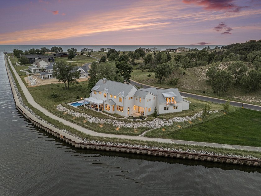 Set behind the gates of NorthShore--Saugatuck's premier - Beach Home for sale in Saugatuck, Michigan on Beachhouse.com