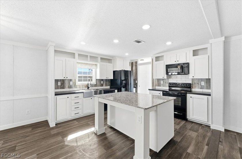 Discover the perfect blend of comfort and community in this - Beach Home for sale in North Fort Myers, Florida on Beachhouse.com