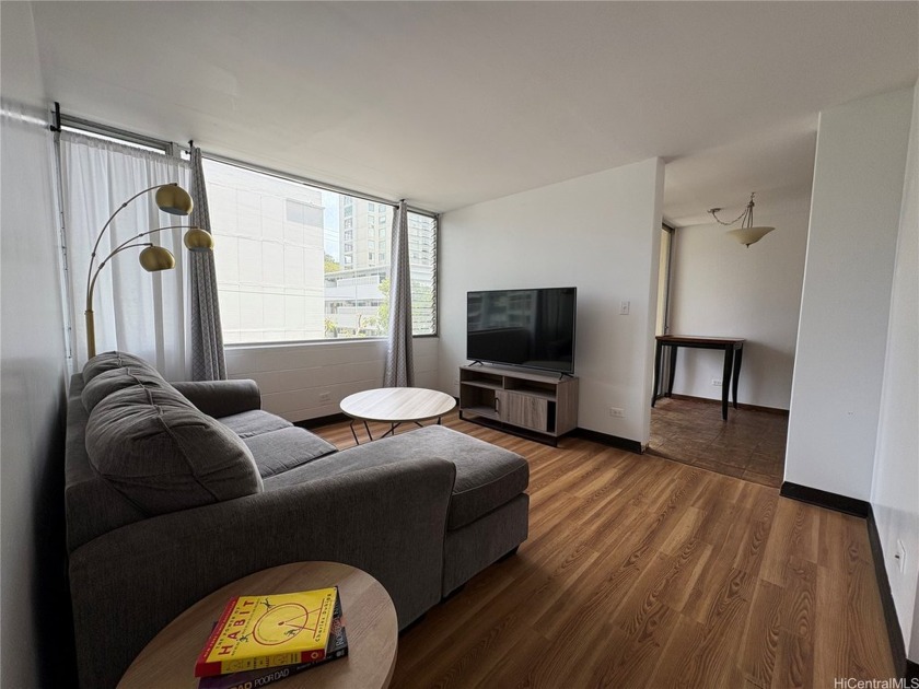 Welcome to this delightful 2-bedroom, 1-bathroom condo that - Beach Condo for sale in Honolulu, Hawaii on Beachhouse.com