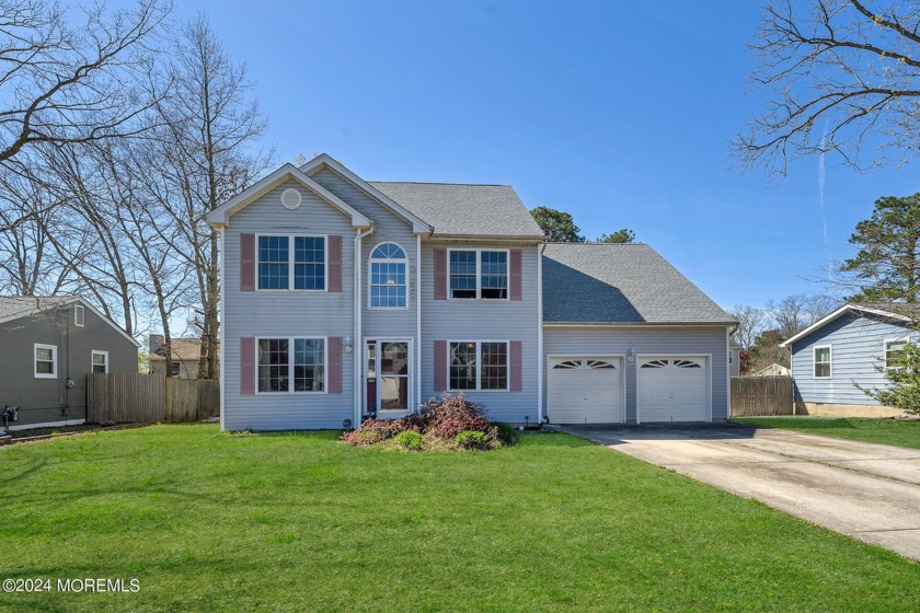 This spacious Colonial in desired Ocean Acres was built in 1998 - Beach Home for sale in Manahawkin, New Jersey on Beachhouse.com
