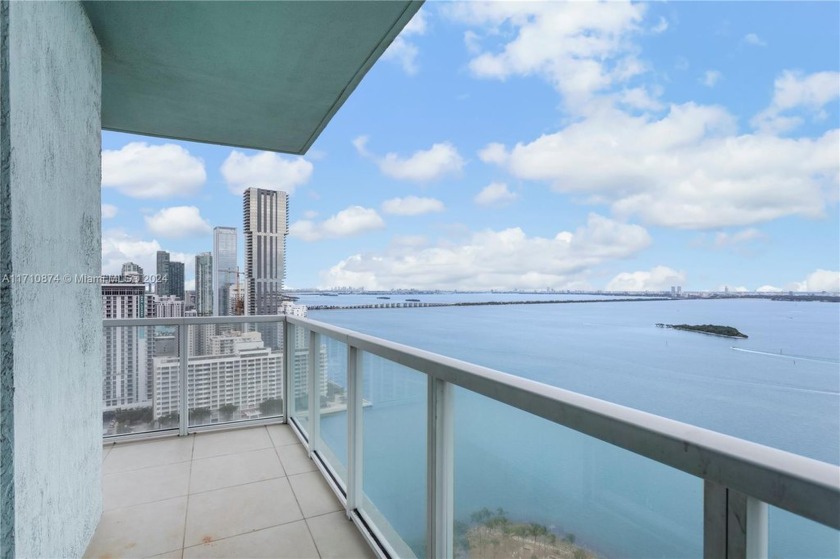 Experience waterfront living in this high-floor corner unit with - Beach Condo for sale in Miami, Florida on Beachhouse.com