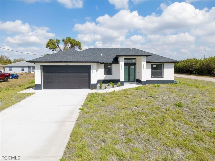 Discover this beautifully designed 3-bedroom, 2-bath home in the - Beach Home for sale in Lehigh Acres, Florida on Beachhouse.com