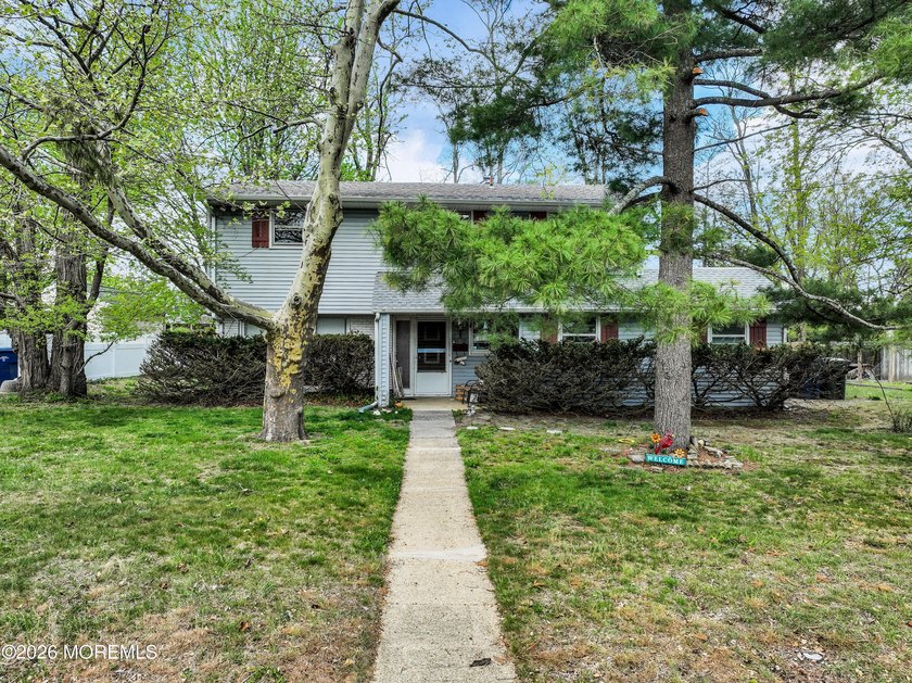 Calling all renovators! Bring your vision to this Split-Level - Beach Home for sale in Oakhurst, New Jersey on Beachhouse.com