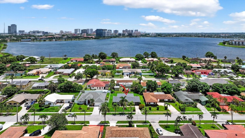 Welcome to this beautifully renovated single-family home - Beach Home for sale in West Palm Beach, Florida on Beachhouse.com