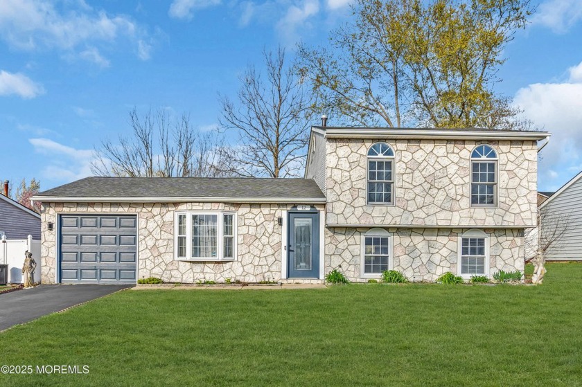 This charming split-level with an inground pool features three - Beach Home for sale in Barnegat, New Jersey on Beachhouse.com