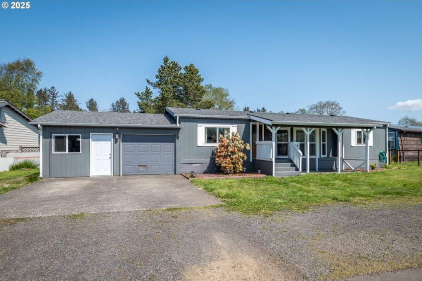 Enjoy coastal living in this charming town! This updated home in - Beach Home for sale in Ilwaco, Washington on Beachhouse.com