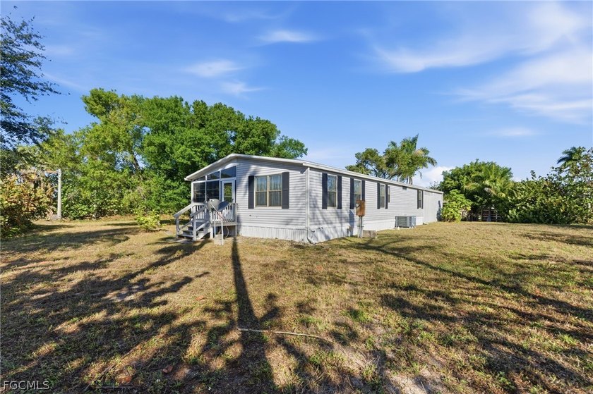 Welcome to the laid-back charm of Pine Island living! Nestled on - Beach Home for sale in Bokeelia, Florida on Beachhouse.com