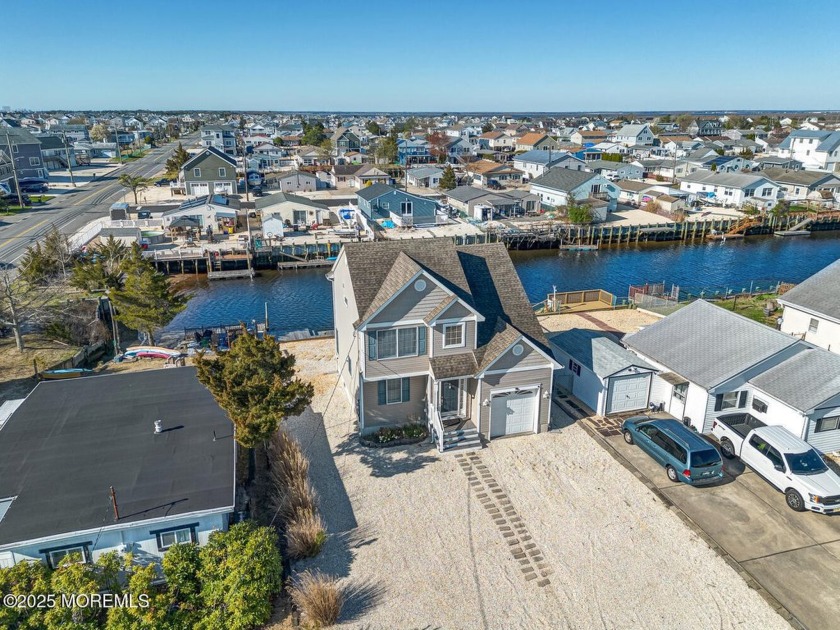 Discover the allure of this exceptional custom-built waterfront - Beach Home for sale in Little Egg Harbor, New Jersey on Beachhouse.com