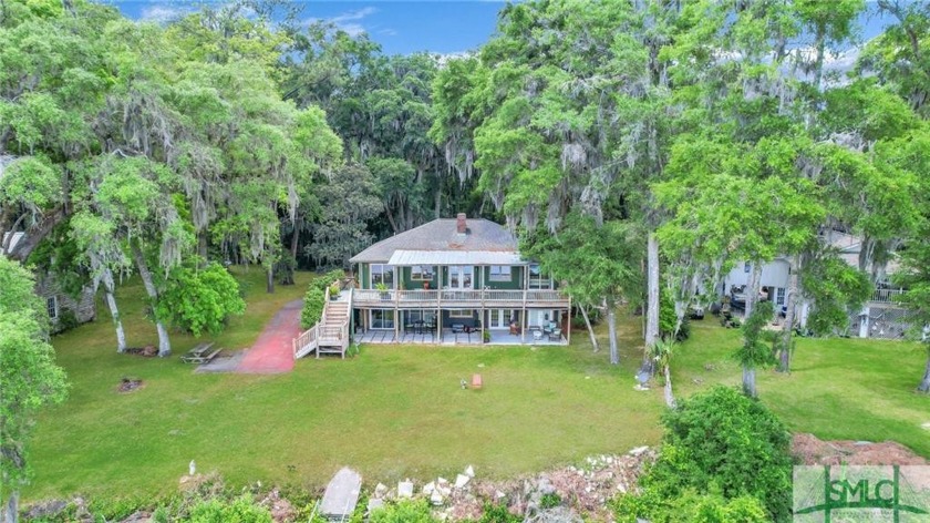 This stunning display of Southern elegance in the heart of - Beach Home for sale in Richmond Hill, Georgia on Beachhouse.com