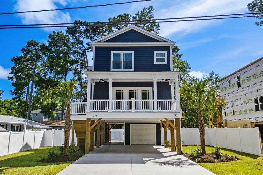 Welcome to this beautifully designed brand new construction 4 - Beach Home for sale in Surfside Beach, South Carolina on Beachhouse.com
