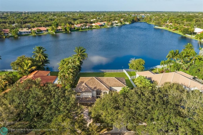 Spectacular lake-front home in The Estates of Embassy Lakes - Beach Home for sale in Cooper City, Florida on Beachhouse.com