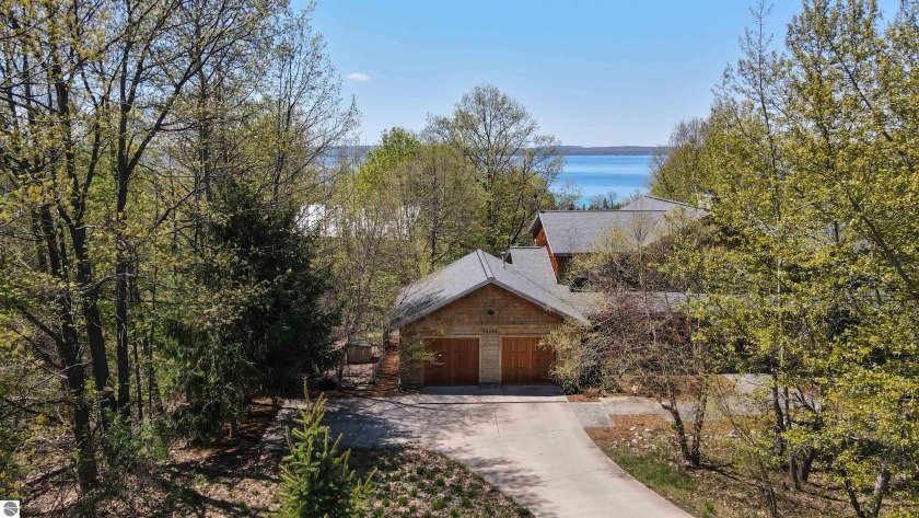 Echos of Frank Lloyd Wright's influences ring throughout this - Beach Home for sale in Traverse City, Michigan on Beachhouse.com