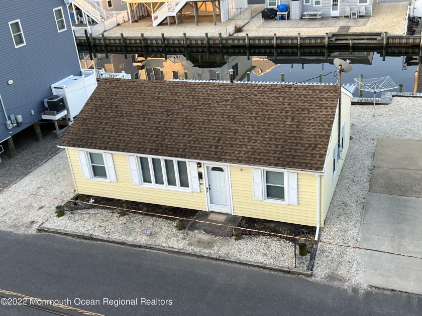 Rare opportunity to own waterfront home in private Sunset Manor - Beach Home for sale in Lavallette, New Jersey on Beachhouse.com