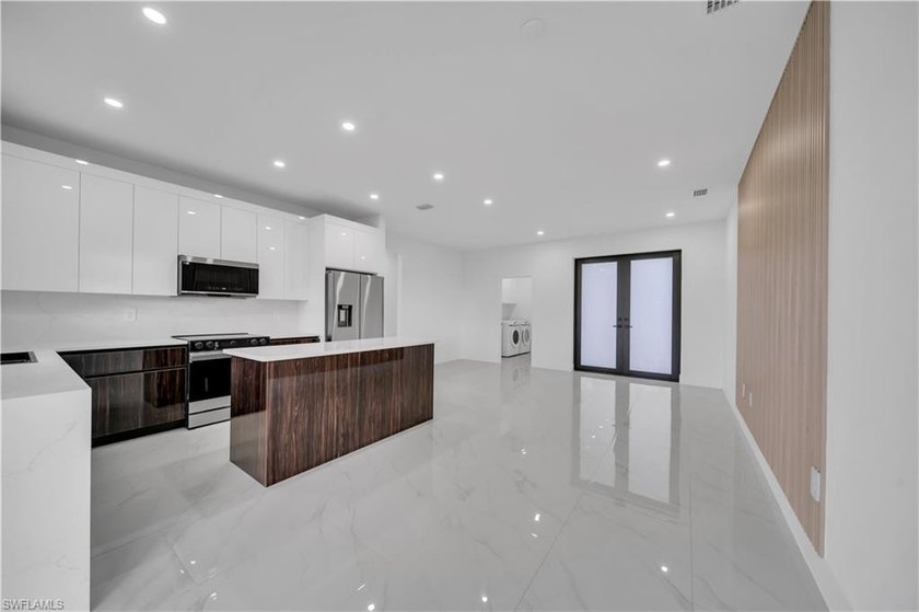 Stunning brand new 3 bedroom, 2 bathroom home featuring modern - Beach Home for sale in Lehigh Acres, Florida on Beachhouse.com