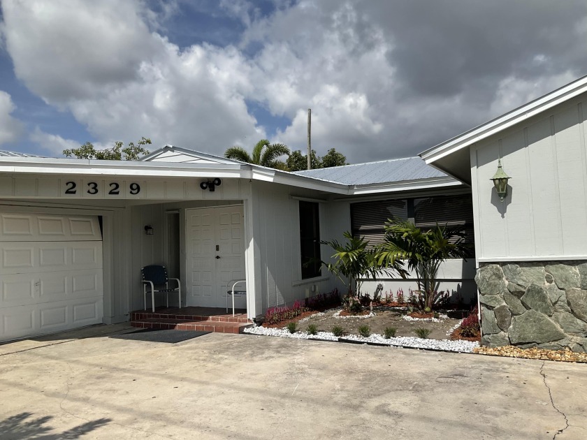 CENTRALLY LOCATED, LOCATION,LOCATION,LOCATION ,JUST WEST OF LAKE - Beach Home for sale in West Palm Beach, Florida on Beachhouse.com