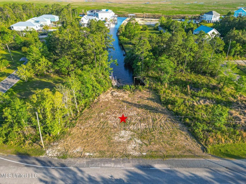 Waterfront living at its finest! This incredible lot on the - Beach Lot for sale in Diamondhead, Mississippi on Beachhouse.com