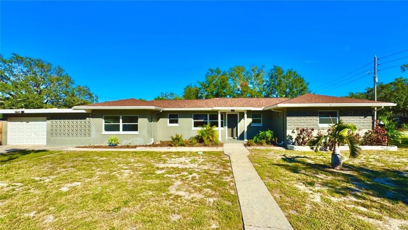 PRICED TO SELL!!!! Spacious and beautifully updated home on a - Beach Home for sale in Tarpon Springs, Florida on Beachhouse.com