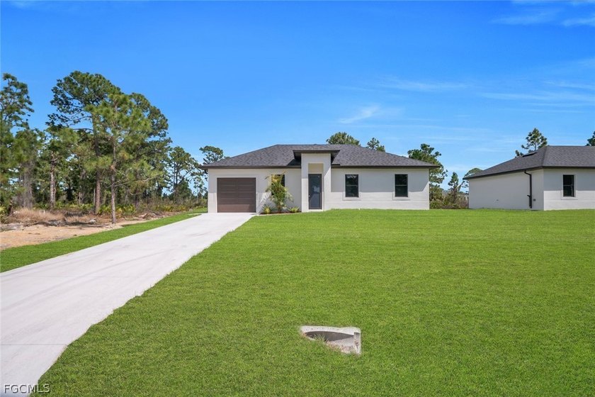 Welcome to your future home, where modern elegance meets - Beach Home for sale in Lehigh Acres, Florida on Beachhouse.com