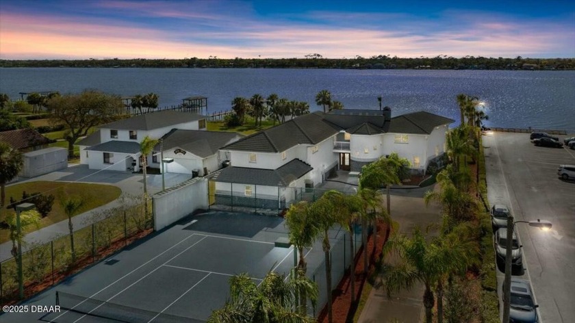 Welcome to 2621 N. Halifax Avenue. This contemporary home is - Beach Home for sale in Daytona Beach, Florida on Beachhouse.com