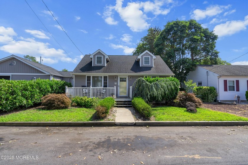Live the Ocean Gate lifestyle! This 4-bedroom, 2-bath Cape Cod - Beach Home for sale in Ocean Gate, New Jersey on Beachhouse.com