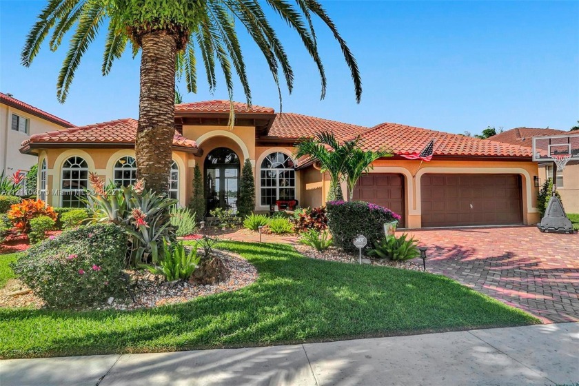 GORGEOUS HOME ON THE WIDE LAKE IN THE HIGHLY SOUGHT AFTER - Beach Home for sale in Miramar, Florida on Beachhouse.com