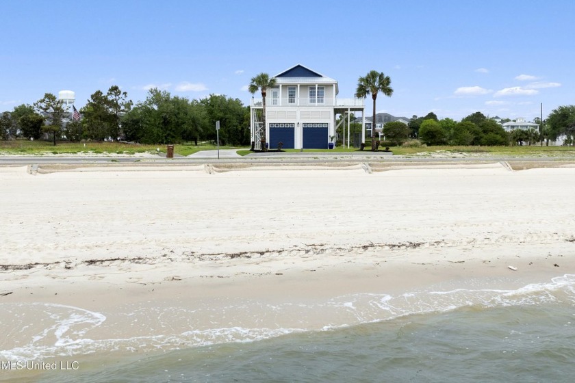 Coastal charm meets modern elegance in this elevated beachside - Beach Home for sale in Long Beach, Mississippi on Beachhouse.com