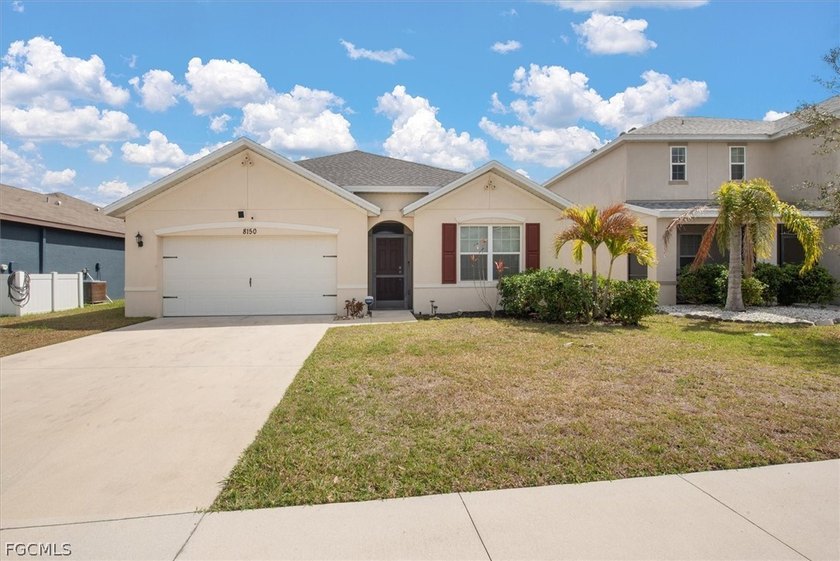 This beautiful home is in the Gated neighborhood of Town Lakes - Beach Home for sale in Lehigh Acres, Florida on Beachhouse.com