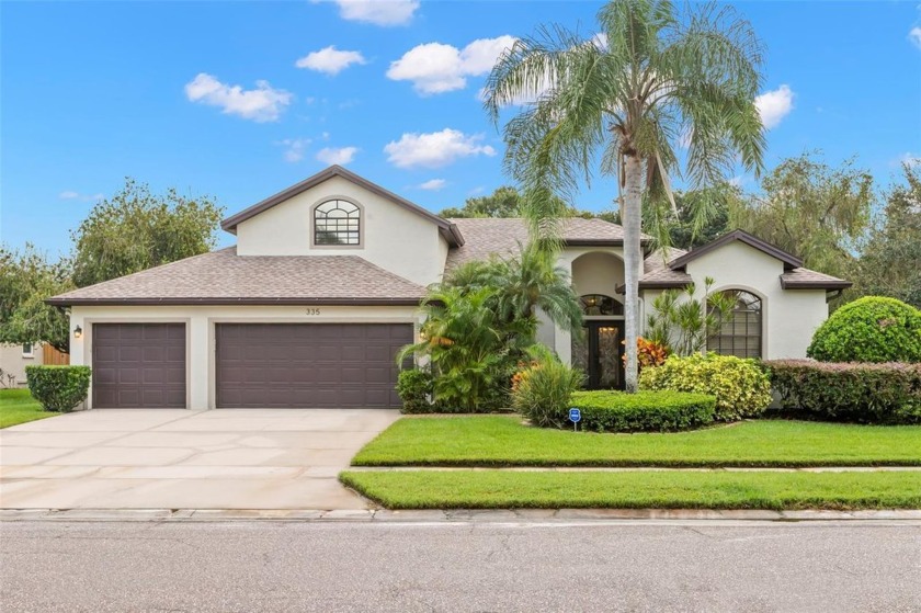 Nestled within the prestigious gated community of East Lake - Beach Home for sale in Oldsmar, Florida on Beachhouse.com