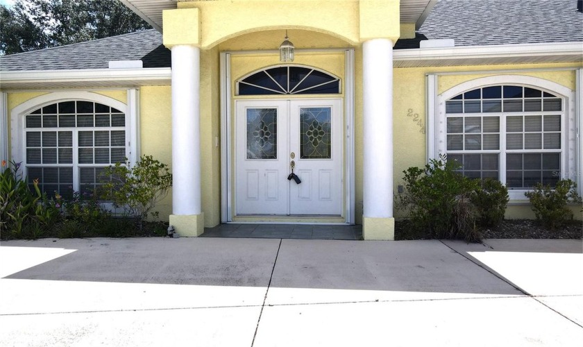 DEEP CREEK - SPACIOUS FAMILY HOME IN A DESIRABLE DEED-RESTRICTED - Beach Home for sale in Punta Gorda, Florida on Beachhouse.com