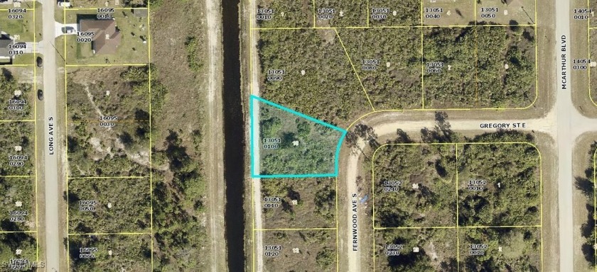 Oversized quarter acre canal lot in the desirable southeast - Beach Lot for sale in Lehigh Acres, Florida on Beachhouse.com