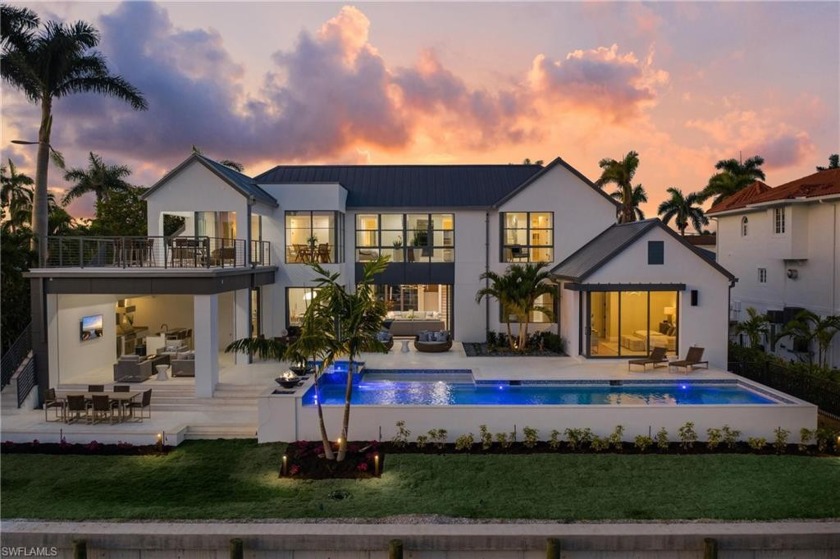 This newly built waterfront home by Oakley Home Builders with - Beach Home for sale in Naples, Florida on Beachhouse.com
