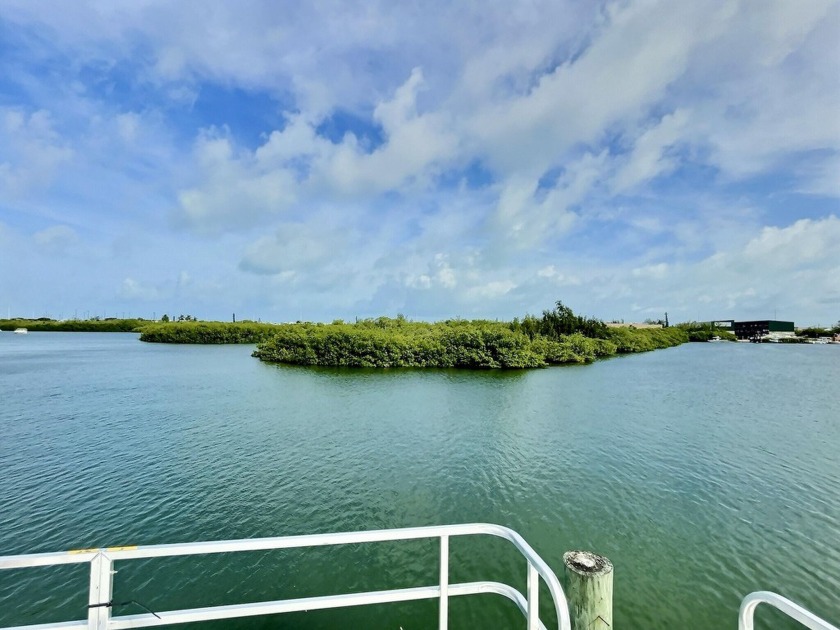 Live aboard boat slip offered in Sombrero Marina is 52' long; - Beach Lot for sale in Marathon, Florida on Beachhouse.com