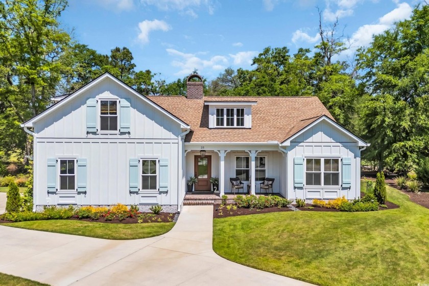 Step into timeless Southern elegance at 25 Northwoods Ct, a - Beach Home for sale in Pawleys Island, South Carolina on Beachhouse.com